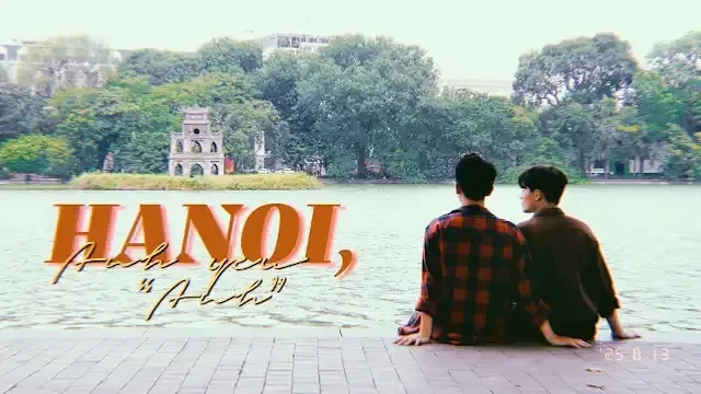 Two characters sit by the lake in "HÀ NỘI, ANH YÊU"ANH", with a scenic background.
