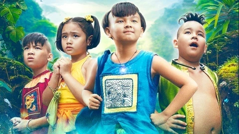 Four kids in colorful outfits pose in a forest for "Trạng Tí".