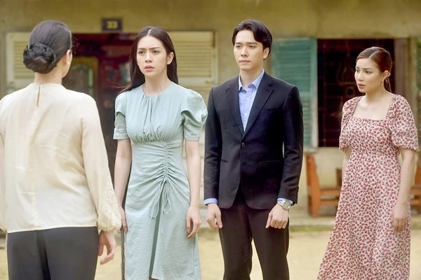 Group of people in an outdoor scene from "Trên Cả Tình Thân".